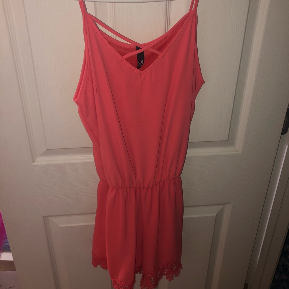 Romper with floral detail on bottom